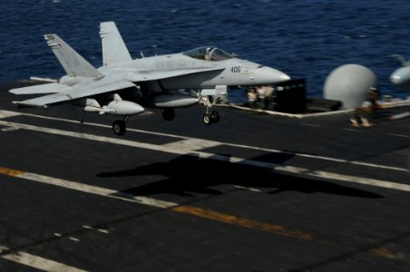 US Navy 091111-N-3038W-032 An F-A-18C Hornet lands aboard the aircraft carrier USS Nimitz (CVN 68) photo