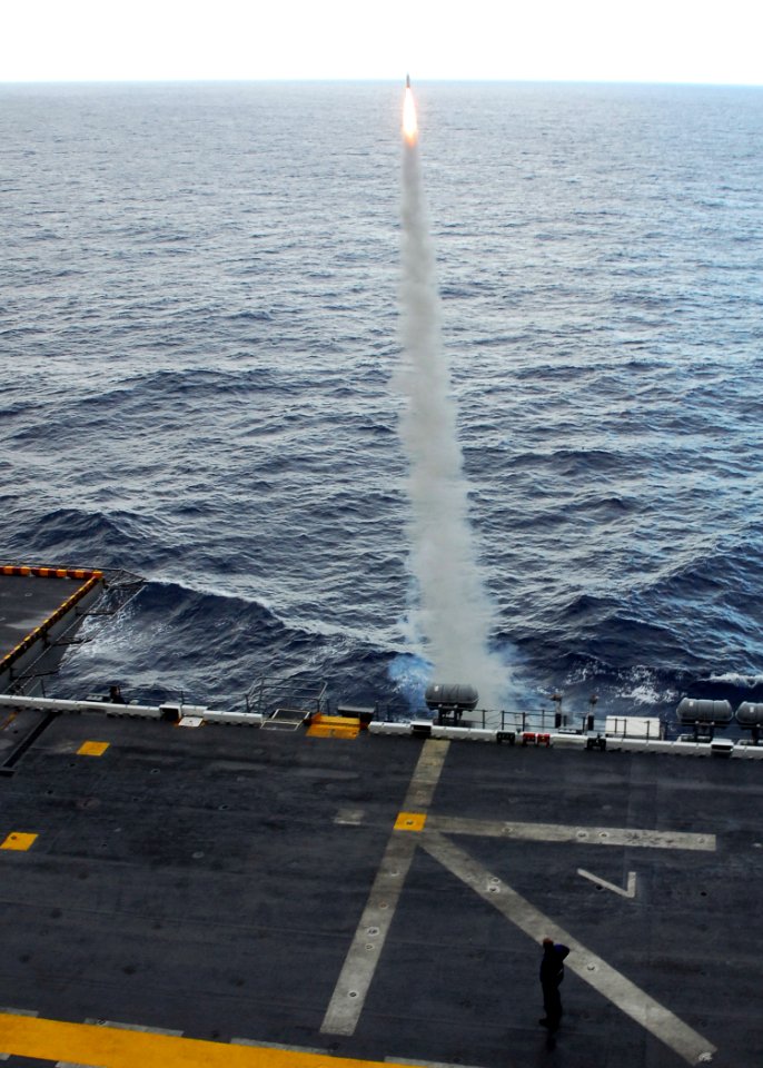 US Navy 081021-N-2183K-100 A chaff radar countermeasure rocket is launched from the port side of the amphibious assault ship USS Peleliu (LHA 5) during a training exercise