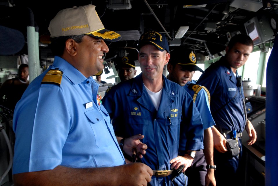 US Navy 081020-N-1635S-012 Capt. John P. Nolan, commanding officer of the Ticonderoga-class guided-missile cruiser USS Chancellorsville (CG 62), speaks with Rear Adm. Anil Chopra, flag officer in command of the Indian Navy's we