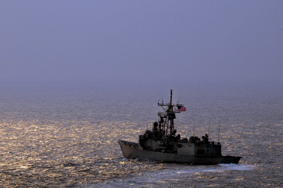 US Navy 081022-N-5961C-004 The guided-missile frigate USS Thach (FFG 43) positions itself for a passing exercise