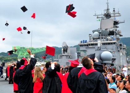 US Navy 090606-N-4010S-147 Graduating students from E. J. Kings High School Class of 2009 celebrate their graduation onboard