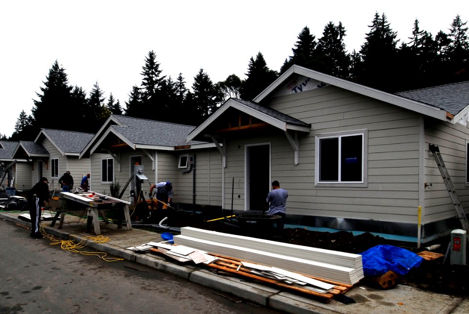 US Navy 081021-N-7883G-048 Sailors assigned to the aircraft carrier USS Kitty Hawk (63) work on three Habitat for Humanity homes in the Bremerton