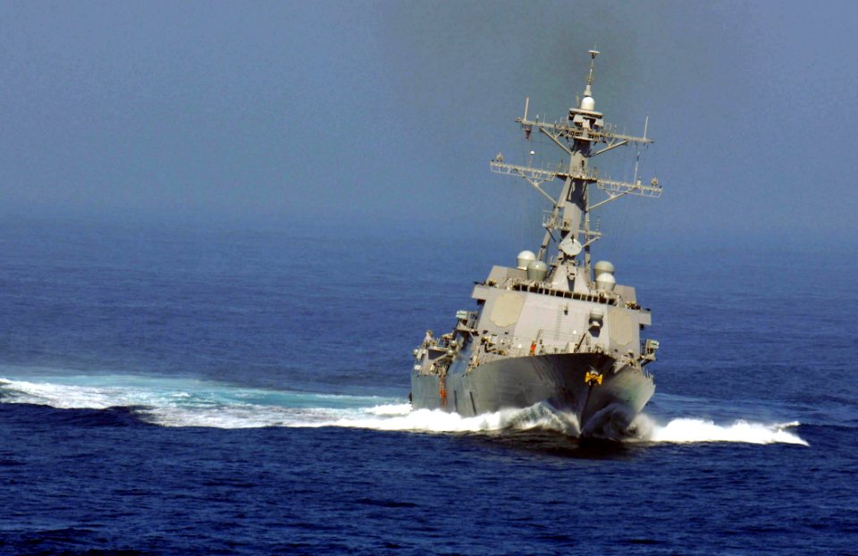 US Navy 081021-N-9928E-054 he Arleigh Burke-class guided-missile destroyer USS Kidd (DDG 100) actis as plane guard for the Nimitz-class aircraft carrier USS John C. Stennis (CVN 74)