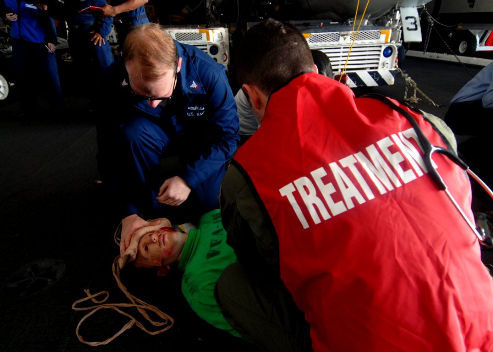 US Navy 081020-N-1038M-015 Aircraft carrier USS George Washington (CVN 73) Sailors participate in a mass casualty drill in the hangar bay