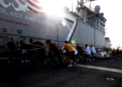 US Navy 081024-N-4236E-061 Sailors and Marines participate in a tractor pull competition during physical training