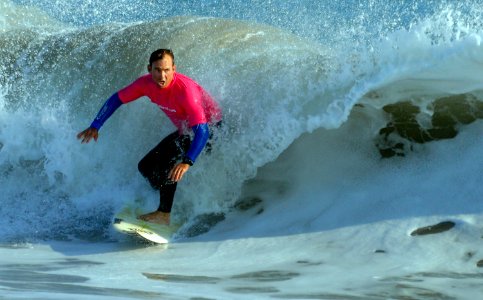 US Navy 081025-N-1722M-449 Jefferey Easson rides a wave off of Point Mugu during the first Naval Base Ventura County Surf Contest photo