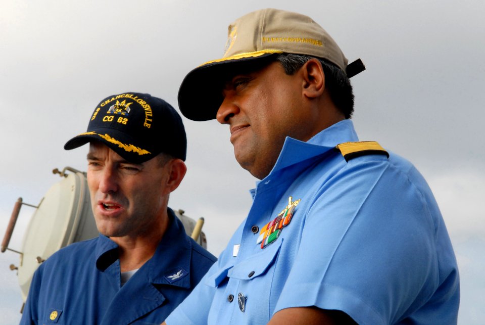 US Navy 081020-N-1635S-013 Capt. John P. Nolan, commanding officer of the Ticonderoga-class guided-missile cruiser USS Chancellorsville (CG 62), speaks with Rear Adm. Anil Chopra, flag officer in command of the Indian Navy's we