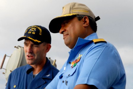 US Navy 081020-N-1635S-013 Capt. John P. Nolan, commanding officer of the Ticonderoga-class guided-missile cruiser USS Chancellorsville (CG 62), speaks with Rear Adm. Anil Chopra, flag officer in command of the Indian Navy's we photo