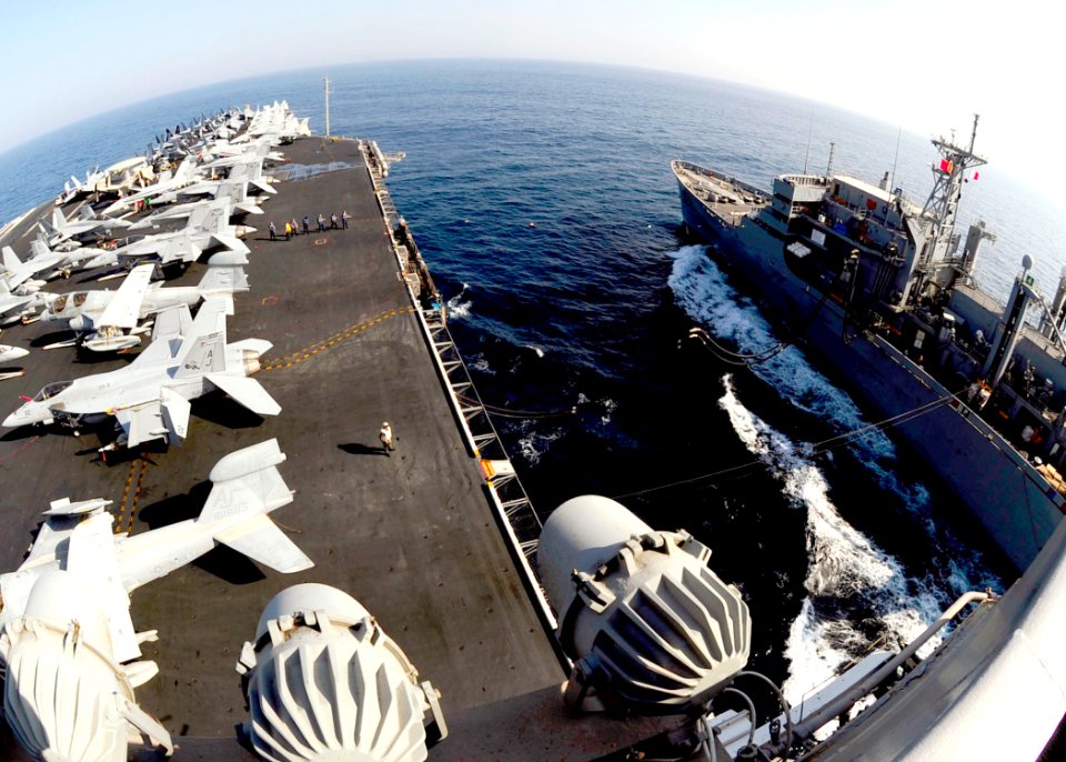 US Navy 081024-N-7571S-001 he aircraft carrier USS Theodore Roosevelt (CVN 71) conducts a replenishment at sea with the Military Sealift Command fast combat support ship USNS Supply (T-AOE 6)