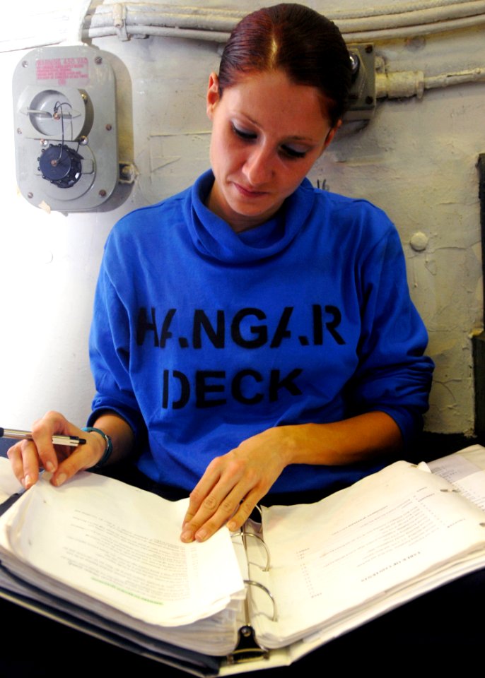 US Navy 081023-N-2456S-056 Aviation Boatswain's Mate (Handling) Airman Jean Blair studies her rate training manual