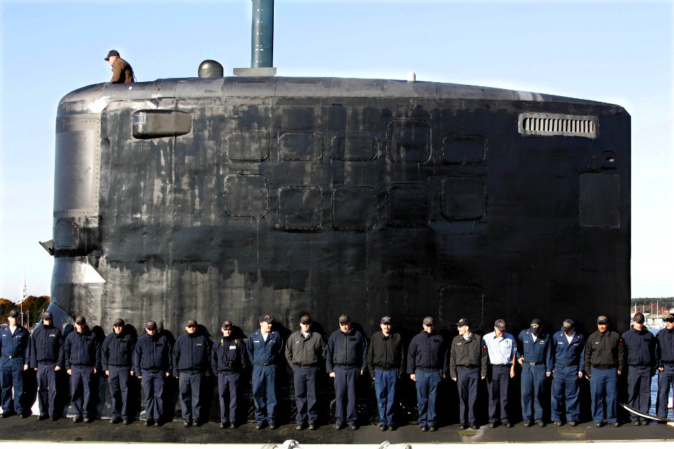 US Navy 081023-N-7441H-005 Crew members from the Virginia-class attack submarine USS New Hampshire (SSN 778) practice manning the ship during a commissioning ceremony rehearsal at Portsmouth Naval Shipyard