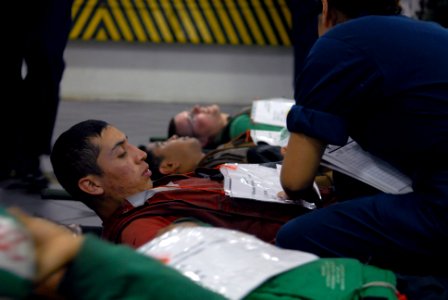 US Navy 081022-N-1635S-002 Sailors simulate personnel casualties during a mass casualties drill