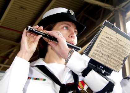 US Navy 081024-N-0879R-007 A musician from the U.S. Pacific Fleet Band plays a piccolo