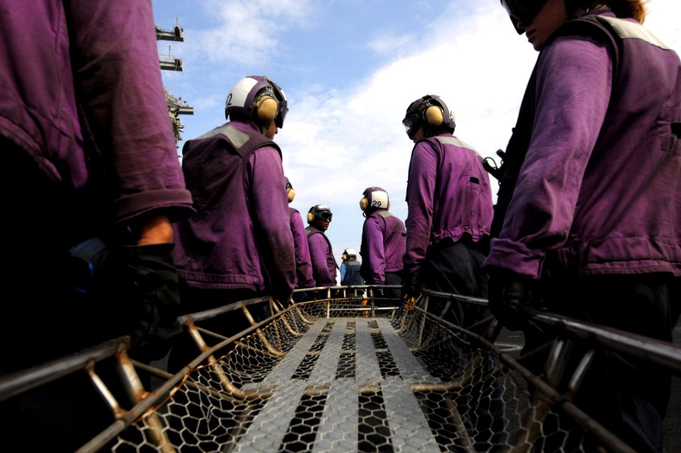 US Navy 081022-N-3659B-106 Aviation Boatswain's Mates (Fuels) act as stretcher bearers