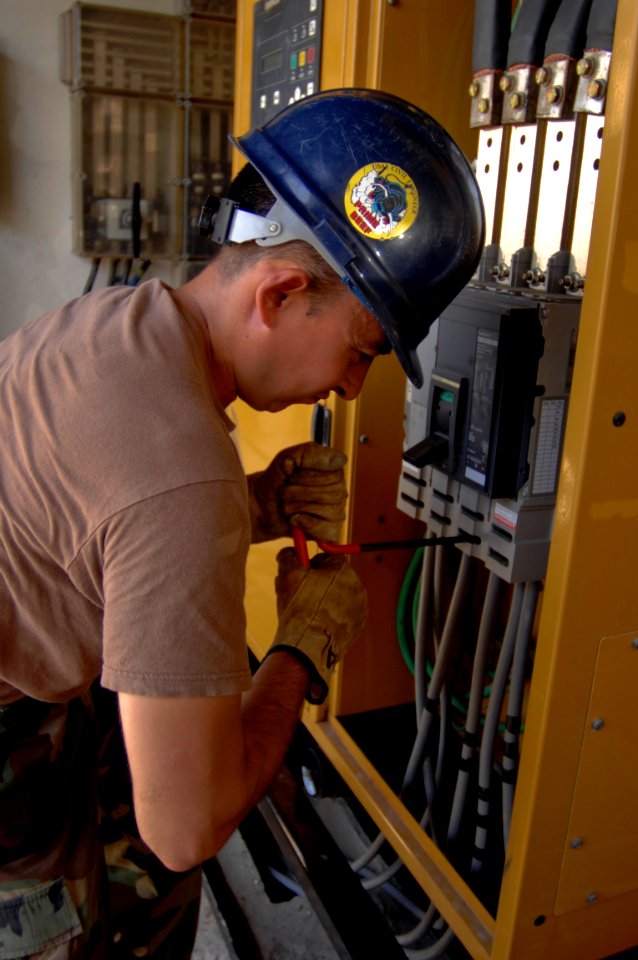 US Navy 081021-N-9620B-010 Staff Sgt. Mark Salazar, a civil engineer embarked aboard USS Kearsarge (LHD 3) hooks up a generator for a local hospital as part of Continuing Promise 08 (CP)
