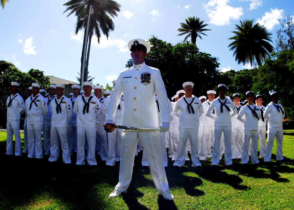 US Navy 081023-N-0995C-021 A Chief Petty Officer stands with Sailors at parade rest during a change of command ceremony