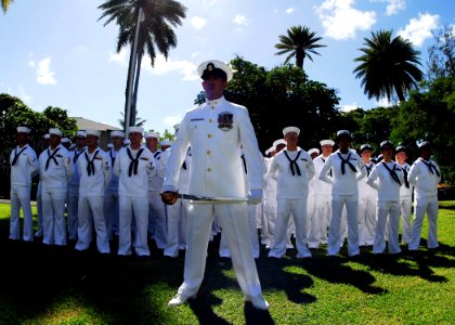 US Navy 081023-N-0995C-021 A Chief Petty Officer stands with Sailors at parade rest during a change of command ceremony
