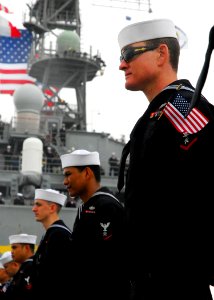 US Navy 081104-N-2183K-013 Sailors man the rails upon their return to homeport photo