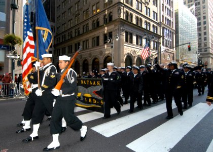 US Navy 081111-N-2636M-173 Sailors march and wave to parade onlookers during New York's annual Veterans Day parade