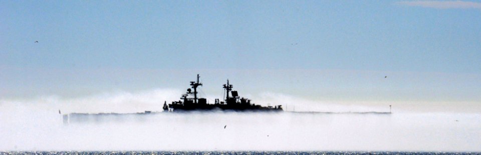 US Navy 081029-N-2959L-020 The amphibious assault ship USS Boxer (LHD 4) is partially obscured by a fog bank off the coast of Naval Amphibious Base Coronado photo