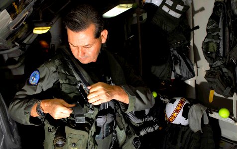 US Navy 081029-N-9928E-214 Rear Adm. David Philman suits up in flight gear