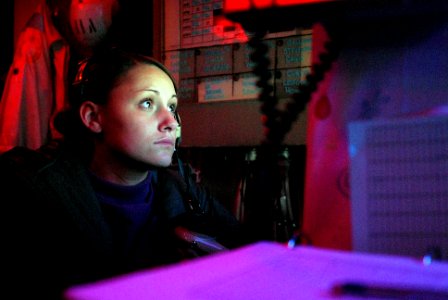 US Navy 081025-N-3610L-102 Aviation Boatswain's Mate (Fuel) Airman Ashley Flores stands a night watch in flight deck control