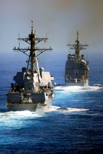 US Navy 081029-N-8157C-228 The Arleigh Burke-class guided-missile destroyer USS Kidd (DDG 100) and the Ticonderoga-class guided-missile cruiser USS Antietam (CG 54) transit the ocean