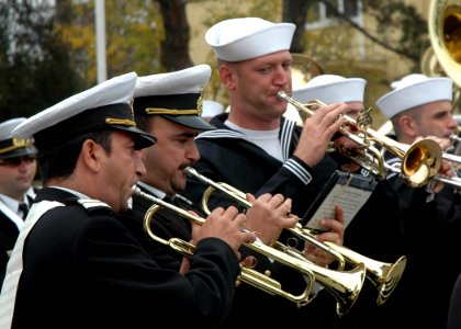 US Navy 081103-N-1655H-003 Musician 2nd Class John Gulyas plays along with members of the Romanian Naval Academy Band