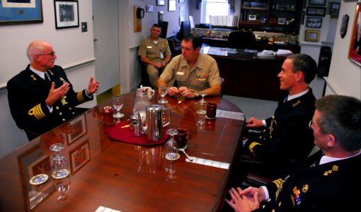 US Navy 081030-N-7705S-008 Visiting Capt. Peter de Harder chats with Vice Adm. John J. Donnelly during a recent tour and luncheon at Commander, Submarine Force headquarters photo