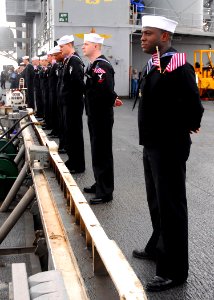 US Navy 081104-N-2183K-018 Sailors man the rails upon their return to homeport