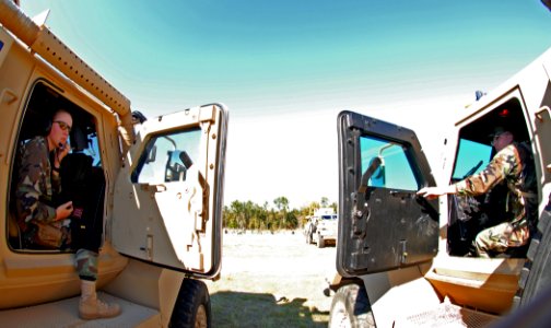 US Navy 081102-N-7367K-005 Seabees assigned to Naval Mobile Construction Battalion (NMCB) 1 confirm communications at the logistics support area before deploying on a convoy