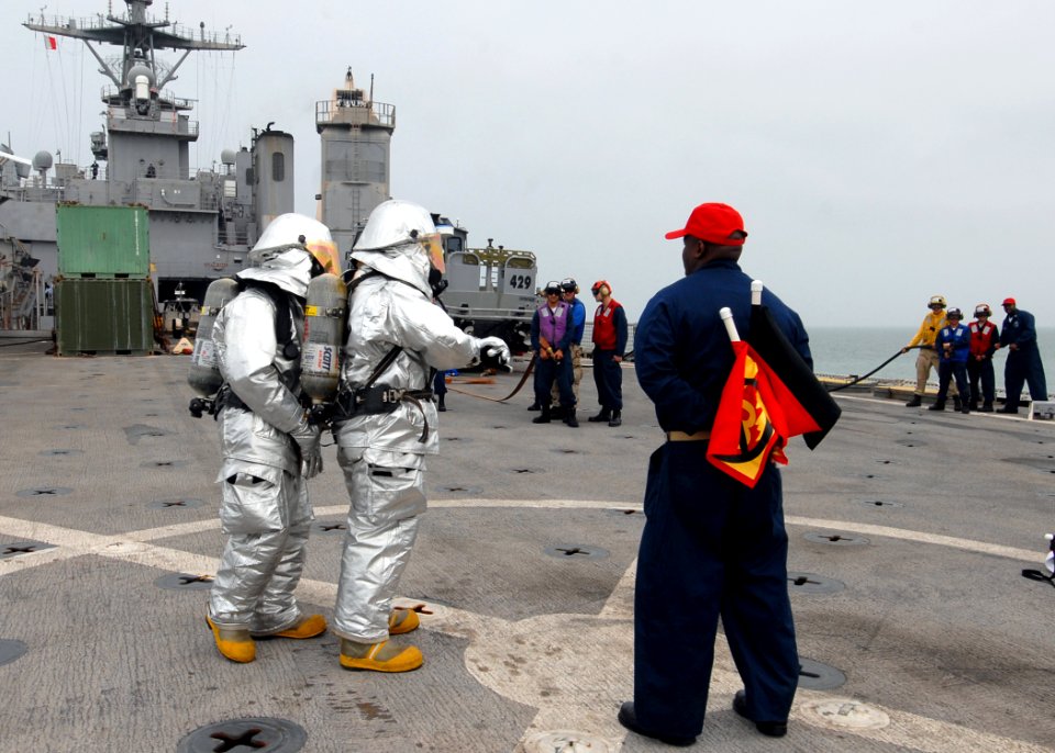 US Navy 081104-N-9134V-137 Sailors conduct crash and salvage drills aboard the amphibious dock landing ship USS Carter Hall (LSD 50)