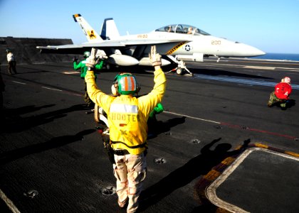 US Navy 081103-N-7571S-007 Flight deck personnel prepare an F-A-18 Super Hornet to be launched