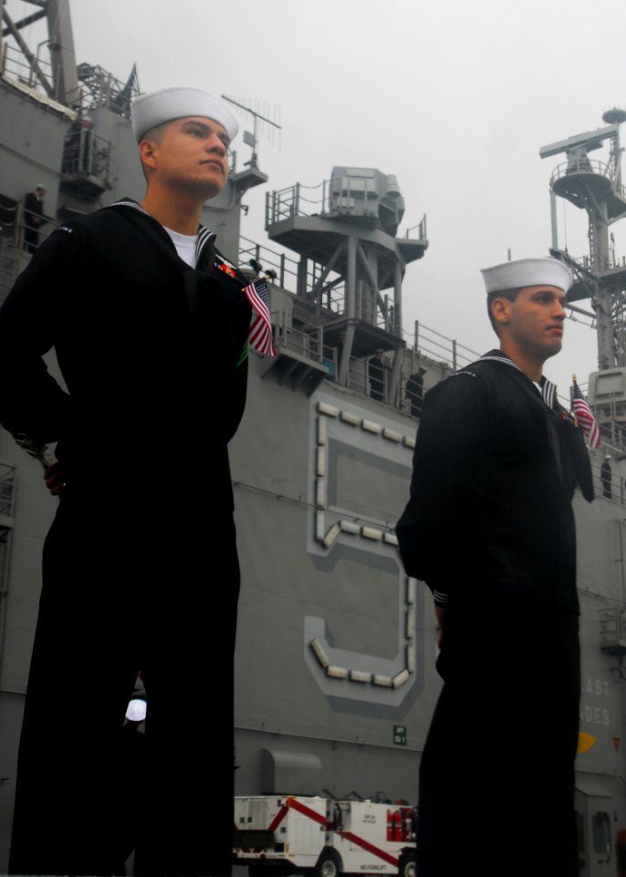 US Navy 081104-N-5148B-002 Sailors man the rails upon their return to homeport