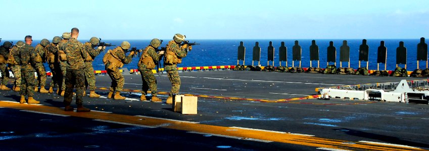 US Navy 081104-N-4774B-317 Marines fire at targets during small arms training