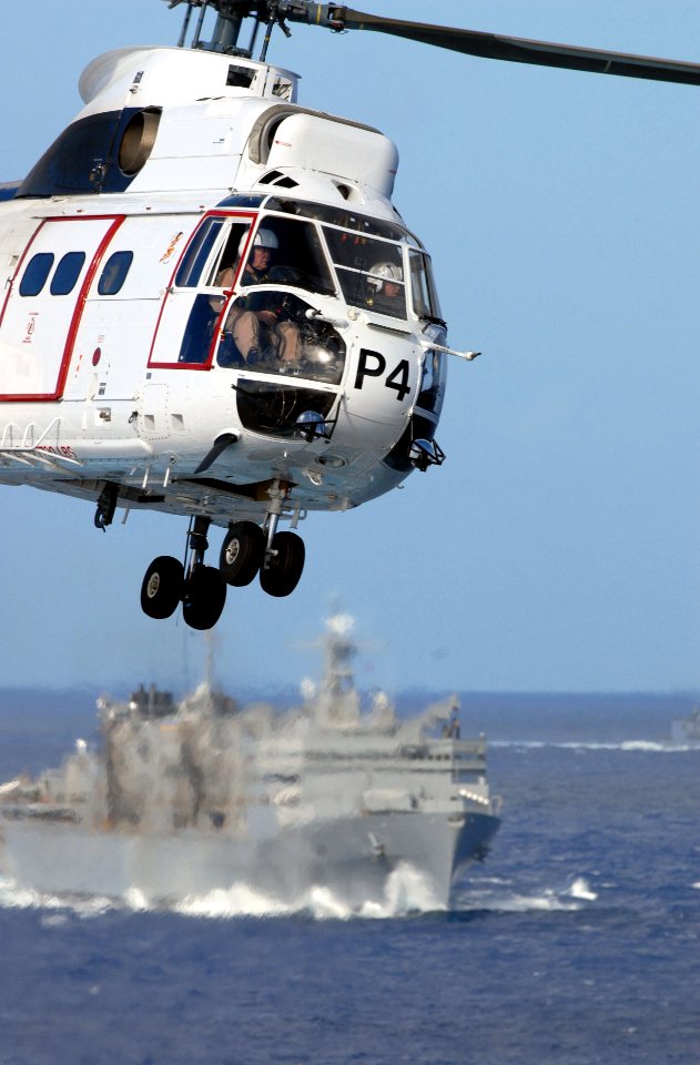 US Navy 081108-N-4005H-105 An AS 332 Super Puma takes off from the flight deck of the Nimitz-class aircraft carrier USS Ronald Reagan (CVN 76) during a vertical replenishment (VERTREP)
