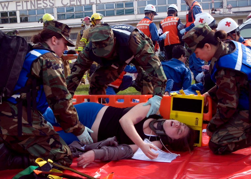 US Navy 081106-N-0483B-003 Hospital corpsmen assigned to U.S Naval Hospital Yokosuka prepare to transport a simulated victim during a joint mass casualty exercise at Fleet Activities Yokosuka