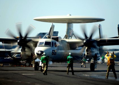 US Navy 081103-N-7571S-003 Flight deck personnel prepare an E-2C Hawkeye to launch