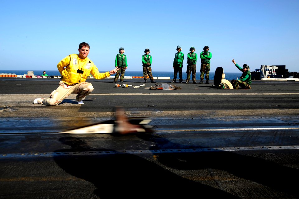 US Navy 081103-N-7571S-012 Lt. Cmdr. Eric Hanks shoots his boots off catapult 2 aboard the Nimitz-class aircraft carrier USS Theodore Roosevelt (CVN 71)