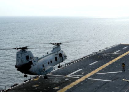 US Navy 081106-N-9520G-008 A CH-46E Seaknight helicopter lands aboard the amphibious assault ship USS Essex (LHD 2)