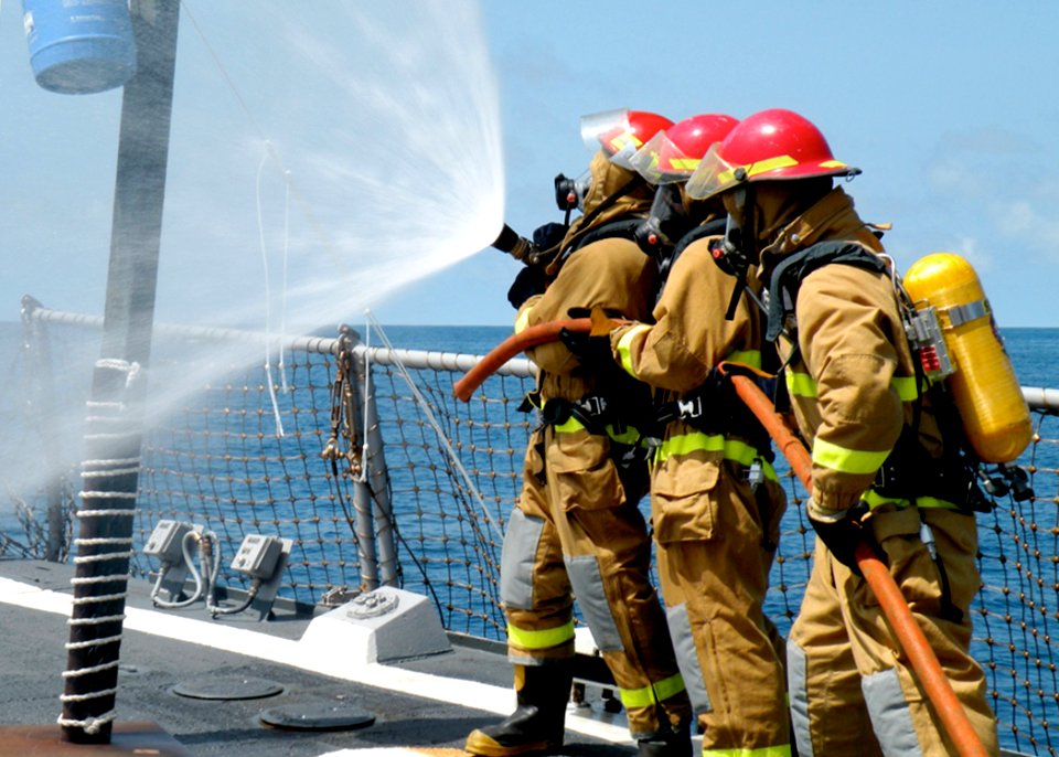 US Navy 081108-N-2604W-236 Sailors participate in damage control training Olympics aboard the guided-missile destroyer USS Roosevelt (DDG 80)