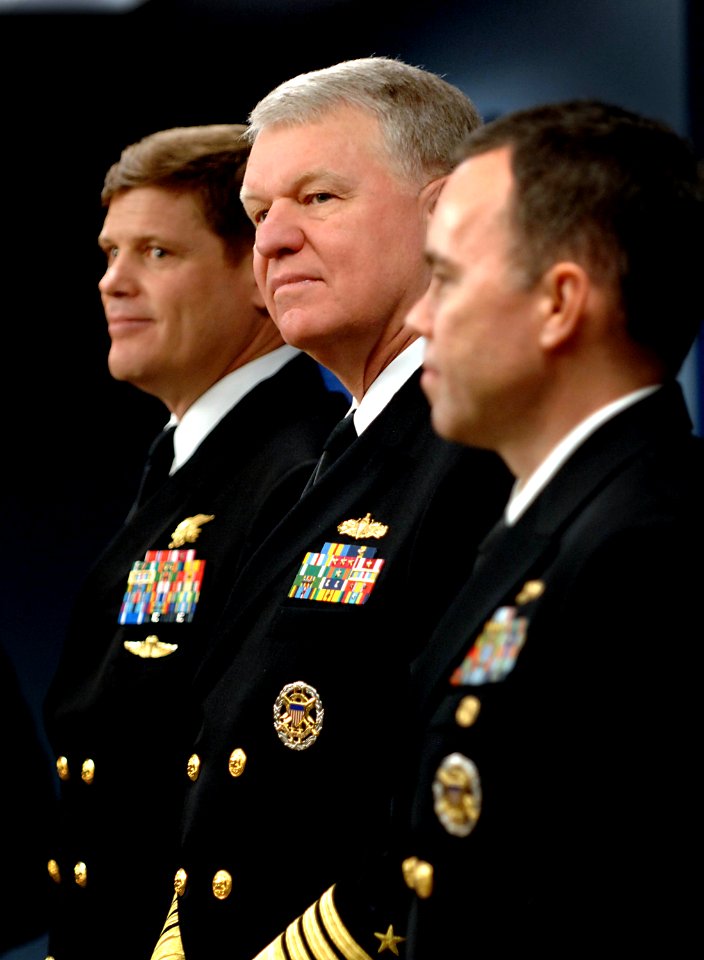 US Navy 081104-N-8273J-004 Chief of Naval Operations (CNO) Adm. Gary Roughead honors Vice Adm. James B. Stockdale Leadership Award recipients Cmdr. Robert E. Smith, left and Cmdr. Paul J. Lyons