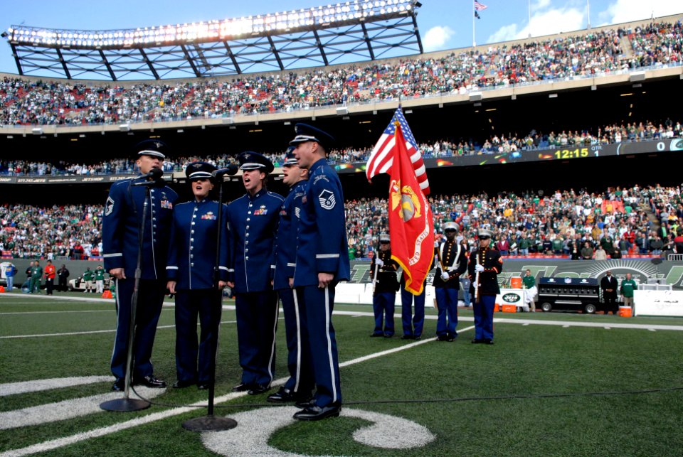 US Navy 081109-N-9818V-189 Members of the United States Air Force sing the National Anthem at the Meadowlands before the NFL game between the New York Jets and St. Louis Rams