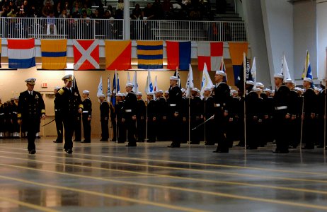 US Navy 081107-N-8273J-111 Chief of Naval Operations (CNO) Adm. Gary Roughead performs a pass and review of 956 newly graduated recruits at a Recruit Training Command graduation in Great Lakes