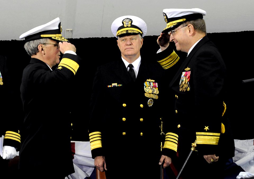 US Navy 081106-N-8273J-114 Rear Adm. James P. Wisecup, left, relieves Rear Adm. Jacob L. Shuford as president of United States Naval War College during a change of command ceremony
