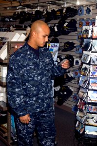 US Navy 081107-N-9999X-004 A Sailor wears the Navy working uniform (NWU) while shopping at the Naval Air Station Oceana Navy Exchange