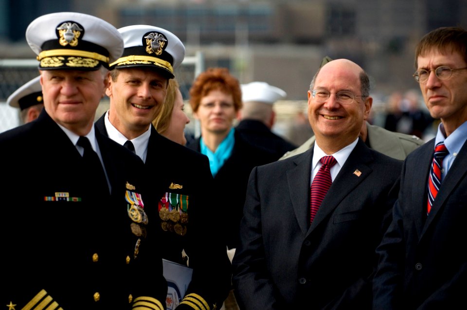 US Navy 081108-N-5549O-017 Secretary of the Navy the Honorable Dr. Donald C. Winter speaks with Blue team commanding officer Cmdr. Don Gabrielson during the commissioning ceremony for the littoral combat ship USS Freedom (LCS