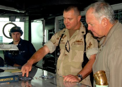 US Navy 081106-N-9134V-173 Cmdr. Jeffrey Sinclair, commanding officer of the amphibious dock landing ship USS Carter Hall (LSD 50),left, gives a tour to James Tuite, aide to West Virginia senator Robert Byrd