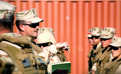 US Navy 081108-N-6932B-019 Senior Chief Store Keeper (EXW) Ray Jeno, command senior enlisted advisor, Boat Division 56, a detachment of Maritime Expeditionary Security Squadron (MESRON) 1, offers words of encouragement to his S