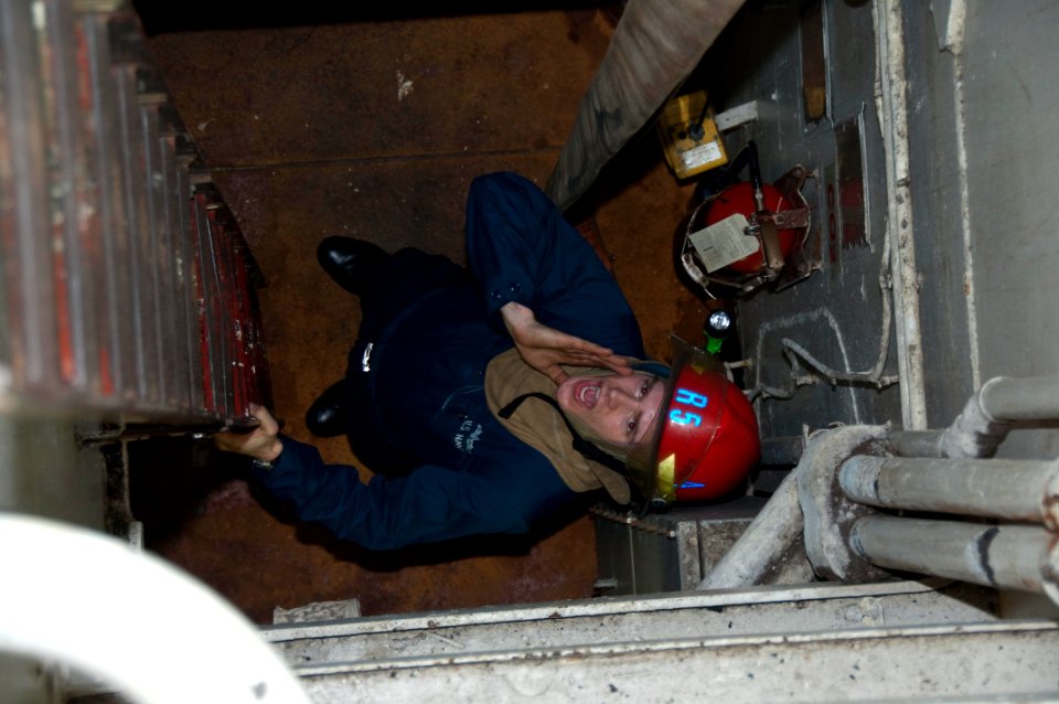 US Navy 100122-N-8936G-018 Sailor participates in a damage control drill aboard USS Nassau